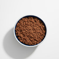 PawCo GreenBites healthy, high quality fresh dog food – top view of bowl and plate with food on white background – PawCo Foods